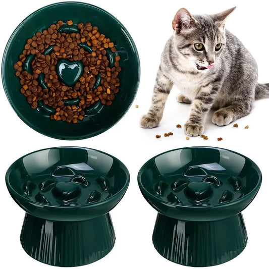 Two ceramic raised cat slow feeder bowls by mypawbloom, designed with ridges to promote healthy eating for cats.